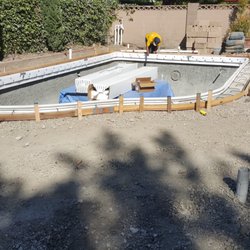 At Last Pool and Spa - Prepping for a pour in place coping . After coping well install tile and get ready for Plaster