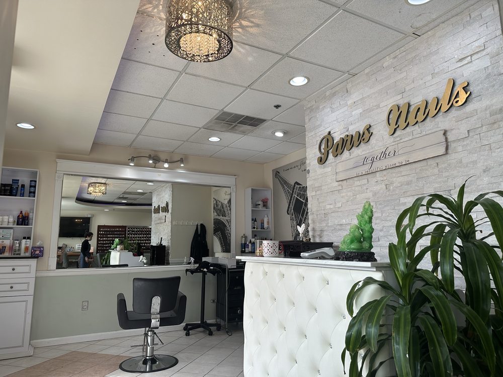 Paradise Hair and Nails Logo