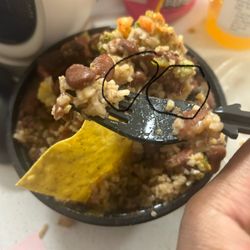 Pura Vida Foods - Hair mixed the rice.