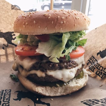 No Bull Burgers - Big Burger (8 oz.) w/ ketchup, mayo, L/T, sautéed onions, swiss cheese, pickles - Burgers Near Me - Toronto, Ontario No Bull Burgers - Big Burger (8 oz.) w/ ketchup, mayo, L/T, sautéed onions, swiss cheese, pickles - Burgers Near Me - Toronto, Ontario