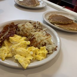 #8 Combo: Two Eggs, Bacon, Hash Browns, and Two Pancakes #8 Combo: Two Eggs, Bacon, Hash Browns, and Two Pancakes