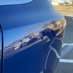 Rear scratches disappeared. Look at reflection on car.