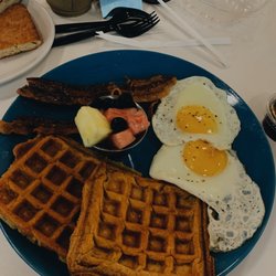 Butter A Louisiana Bakery - Waffles eggs bacon and fruit on the Sunday brunch