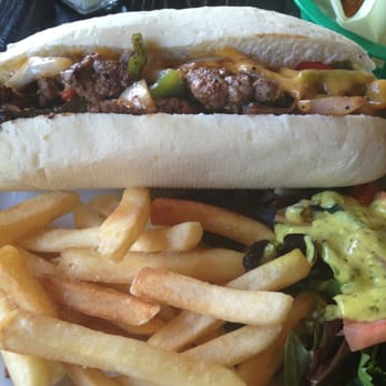 Springbok Bar & Grill - Philly cheese steak sandwich with cheddar cheese. Yummy! - Sports Bars Near Me - Van Nuys, California Springbok Bar & Grill - Philly cheese steak sandwich with cheddar cheese. Yummy! - Sports Bars Near Me - Van Nuys, California