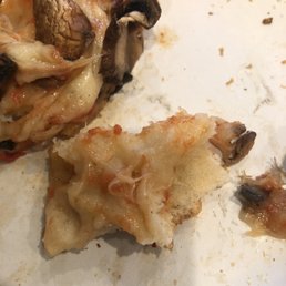 What looks like cheese is actually uncooked raw dough and sauce. Was told they will never deliver to me after requesting a refund for this. What looks like cheese is actually uncooked raw dough and sauce. Was told they will never deliver to me after requesting a refund for this.