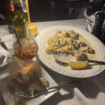 Tramonti Ristorante - Calamari with Gorgonzola cream sauce - Italian Near Me - Thomaston, Connecticut Tramonti Ristorante - Calamari with Gorgonzola cream sauce - Italian Near Me - Thomaston, Connecticut