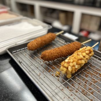 Oh-K-Dog - Corn dogs with options of hot Cheetos, cinnamon sugar, and regular sugar - Korean Near Me - Houston, Texas