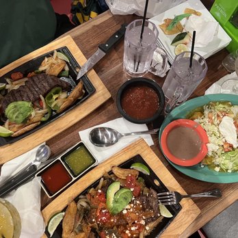 Lola’s Tacos And Tequila - a table full of food - Mexican Near Me - Gurnee, Illinois Lola’s Tacos And Tequila - a table full of food - Mexican Near Me - Gurnee, Illinois