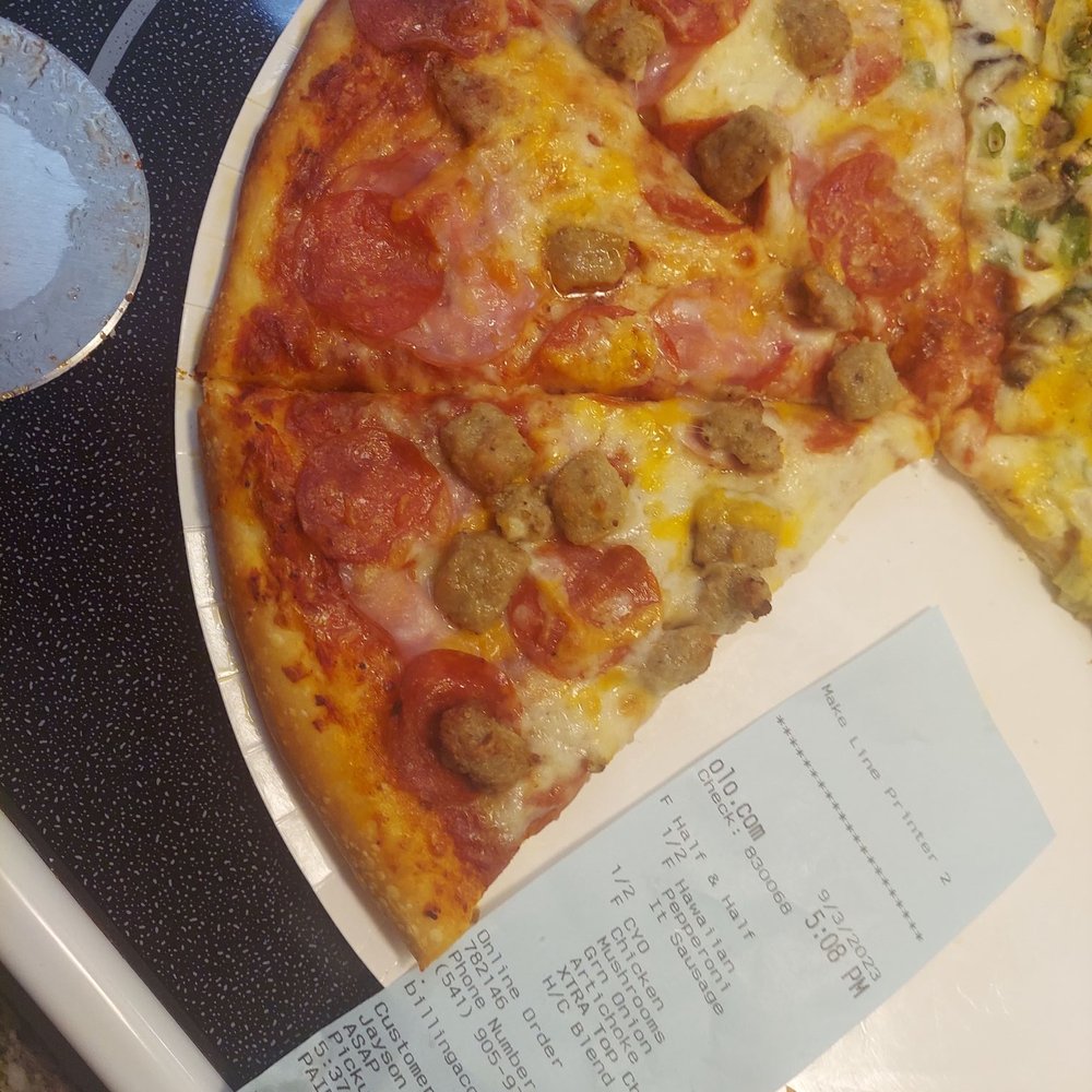 Papa Murphy's - a pizza with a slice missing - Pizza Near Me - Junction City, Oregon Papa Murphy's - a pizza with a slice missing - Pizza Near Me - Junction City, Oregon
