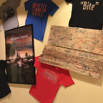 Mystic Grill - Vampire Diaries shirts on the wall - Southern Near Me - Covington, Georgia Mystic Grill - Vampire Diaries shirts on the wall - Southern Near Me - Covington, Georgia