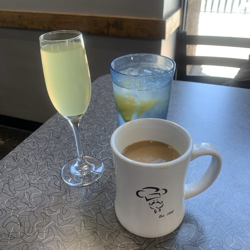 Biscuits Cafe - Decafe coffee  Pineapple mimosa  Water with lemon - Breakfast & Brunch Near Me - Glendale, Arizona