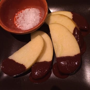 Nopa - On the house appetizers apple slices with dark Choco - New American Near Me - San Francisco, California Nopa - On the house appetizers apple slices with dark Choco - New American Near Me - San Francisco, California