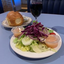Tossed salad fresh bun and of course wine Tossed salad fresh bun and of course wine