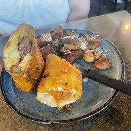 Pork Belly Breakfast Burrito.  Forget the name.  Rosemary Roasted Potatoes in the side.  Wife loved it!  It was massive!!