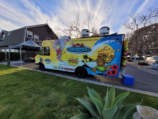 Photo of TK Burgers - Santa Ana, CA, US. a food truck parked in front of a house