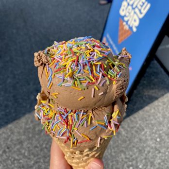 Honey Bear Ice Cream - Double scoop of vegan black star (chocolate w/ brownie) in a gf waffle cone w/ rainbow sprinkles - Food Trucks Near Me - Harrisburg, Pennsylvania Honey Bear Ice Cream - Double scoop of vegan black star (chocolate w/ brownie) in a gf waffle cone w/ rainbow sprinkles - Food Trucks Near Me - Harrisburg, Pennsylvania