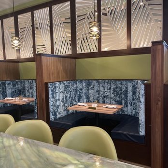 Konoko Restaurant - booth seating (background); bar seating in foreground - Caribbean Near Me - White Marsh, Maryland Konoko Restaurant - booth seating (background); bar seating in foreground - Caribbean Near Me - White Marsh, Maryland
