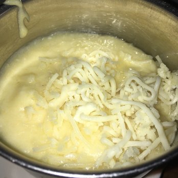 Jacob's Pickles - Cheesy grits side - Comfort Food Near Me - New York, New York Jacob's Pickles - Cheesy grits side - Comfort Food Near Me - New York, New York