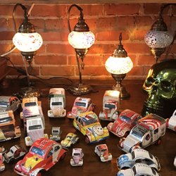 Agora - Lanterns and artsy cars made of some type of paper