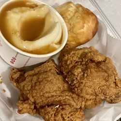 Krispy krunchy chicken - 2 thighs, mashed potatoes and gravy with a biscuit.  Hit the spot!  Yum!