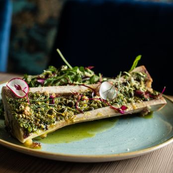 Dolly's - Bone marrow with salsa verde, garlic crumbs, parsley caper salad, and lemon - Cocktail Bars Near Me - New York, New York Dolly's - Bone marrow with salsa verde, garlic crumbs, parsley caper salad, and lemon - Cocktail Bars Near Me - New York, New York