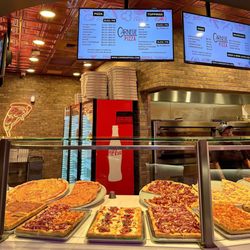 Carnegie Pizza - So many choices. Their pizzas were delicious. They will heat it up once you make your selections.