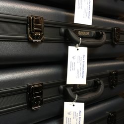 Paul Effman Music - Pictured here are brand new Yamaha Alto Saxophones ready to be rented. We only rent new or like-new Yamaha band instruments.