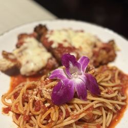 Portola Italian Kitchen - CHICKEN PARMESAN WITH SPAGHETTI MARINARA Marinara Sauce, Fresh Garlic, Melted Mozzarella, Parmigiano Reggiano & Pecorino Romano
