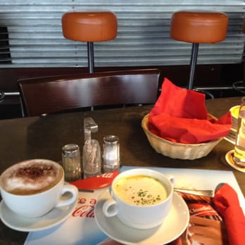 Restaurant Parterre - Kürbissuppe with bread (7,5 CHF) and cappucino (4,2 CHF) - Swiss Food Near Me - Luzern, LU Restaurant Parterre - Kürbissuppe with bread (7,5 CHF) and cappucino (4,2 CHF) - Swiss Food Near Me - Luzern, LU