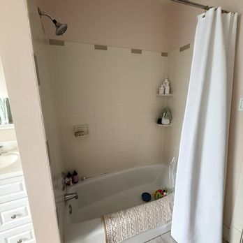 Rosu Construction - Hall Bath Before (low cast iron tub) - General Contractors Near Me Rosu Construction - Hall Bath Before (low cast iron tub) - General Contractors Near Me