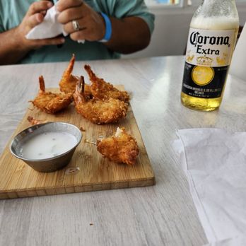 Pura Vida Costa Rican Creative Kitchen - Coconut shrimp and a Corona to start - Seafood Near Me - Isabela, Puerto Rico Pura Vida Costa Rican Creative Kitchen - Coconut shrimp and a Corona to start - Seafood Near Me - Isabela, Puerto Rico