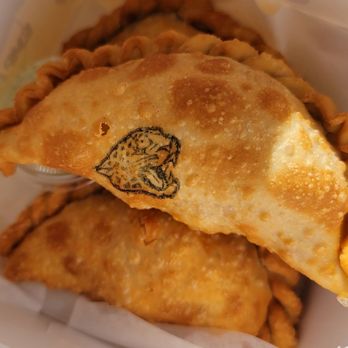Empanada Lady Jax - Jalapeño Jag Popper, Ham & Cheese & Carnitas with Cilantro Creme Sauce - Food Trucks Near Me - Jacksonville, Florida Empanada Lady Jax - Jalapeño Jag Popper, Ham & Cheese & Carnitas with Cilantro Creme Sauce - Food Trucks Near Me - Jacksonville, Florida