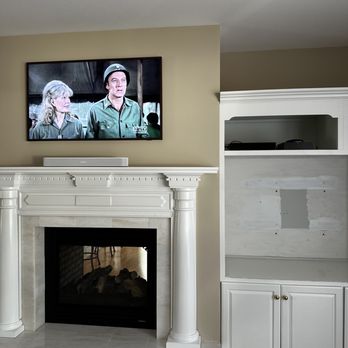 Green Innovation & Enhancements - After install, this is the new TV mounted and sound system installed. - Home Automation Near Me Green Innovation & Enhancements - After install, this is the new TV mounted and sound system installed. - Home Automation Near Me
