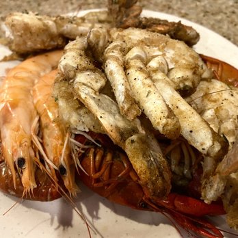 Hot Wok - a plate of cooked shrimp and shrimp - Chinese Near Me - Chalmette, Louisiana
