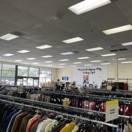 Inside with racks of clothes