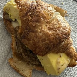 Sausage egg croissant breakfast sandwich