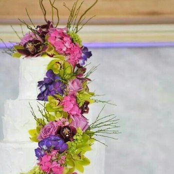 Cake Connection - Beautiful 4-tier wedding cake with orchids and roses by Debra at Cake Connection - Bakeries Near Me - Honolulu, Hawaii Cake Connection - Beautiful 4-tier wedding cake with orchids and roses by Debra at Cake Connection - Bakeries Near Me - Honolulu, Hawaii