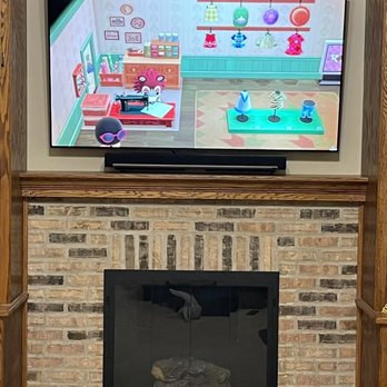 HDforever Electric Solutions - Mounted the tv, installed a new power outlet behind the tv and ran all the cables to the cabinet to the left of the TV. Absolutely perfect! - Home Theatre Installation Near Me - Lake Zurich, Illinois HDforever Electric Solutions - Mounted the tv, installed a new power outlet behind the tv and ran all the cables to the cabinet to the left of the TV. Absolutely perfect! - Home Theatre Installation Near Me - Lake Zurich, Illinois