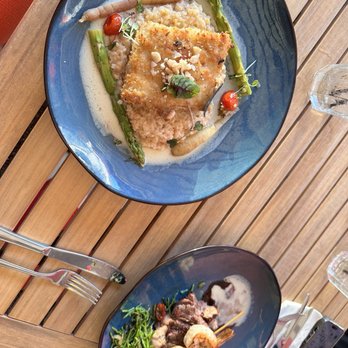 Tikis Grill & Bar - Macadamia Nut Crusted Fish and that night's special, filet with shrimp. - Seafood Near Me - Honolulu, Hawaii Tikis Grill & Bar - Macadamia Nut Crusted Fish and that night's special, filet with shrimp. - Seafood Near Me - Honolulu, Hawaii