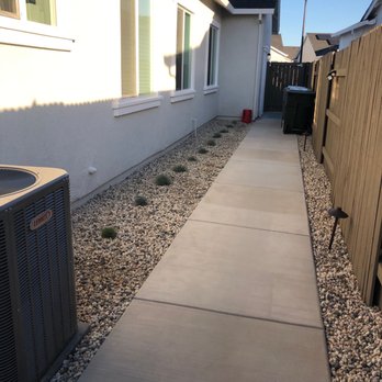 Sunrise Landscape Services - a side yard with a heat pump - Landscaping Near Me Sunrise Landscape Services - a side yard with a heat pump - Landscaping Near Me