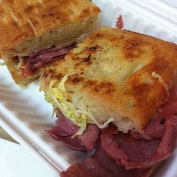 The Sentinel - Corned Beef on Flatbread with Cabbage, Russian Dressing, and Swiss Cheese - Sandwiches Near Me - San Francisco, California