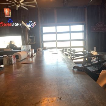 Wolf Pack Woodfired Tavern - Looking down the bar to outside. - American Near Me - Sealy, Texas Wolf Pack Woodfired Tavern - Looking down the bar to outside. - American Near Me - Sealy, Texas