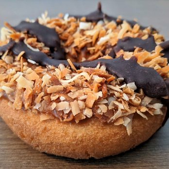 Urban Donut - Urban Donut 1-16-22: Highland Park Donut - Vanilla Cake Donut, Caramel, Toasted Coconut, Chocolate Drizzle - Donuts Near Me - Dallas, Texas