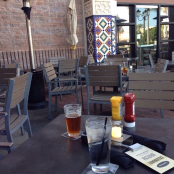Yard House - Nice patio with umbrellas and heat lamps. - New American Near Me - Irvine, California Yard House - Nice patio with umbrellas and heat lamps. - New American Near Me - Irvine, California