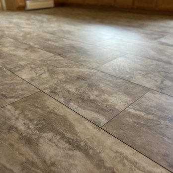 JG Detailed Flooring - a kitchen with a tile floor - Flooring Near Me
