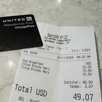 Beercode Kitchen & Bar - A restaurant receipt from Windsor Locks, CT, shows the date 07/11/2024 at 8:33 AM. It lists breakfast items such as Titos Bloody Mary, with prices of $15.50 each, and a subtotal of $46.00. Taxes amount to $3.07, bringing the total to $49.07. The receipt includes a table number, server name, and a Beercode #1122. - Breakfast & Brunch Near Me - Windsor Locks, Connecticut