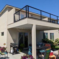 Level Up General Construction - Composite deck with wire handrail and water proof soffit system