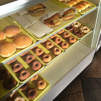 Hey Donut - a display case filled with various types of donuts - Donuts Near Me - Irving, Texas