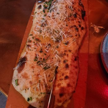 The Refuge - Garlic bread - Latin American Near Me - Melville, New York The Refuge - Garlic bread - Latin American Near Me - Melville, New York