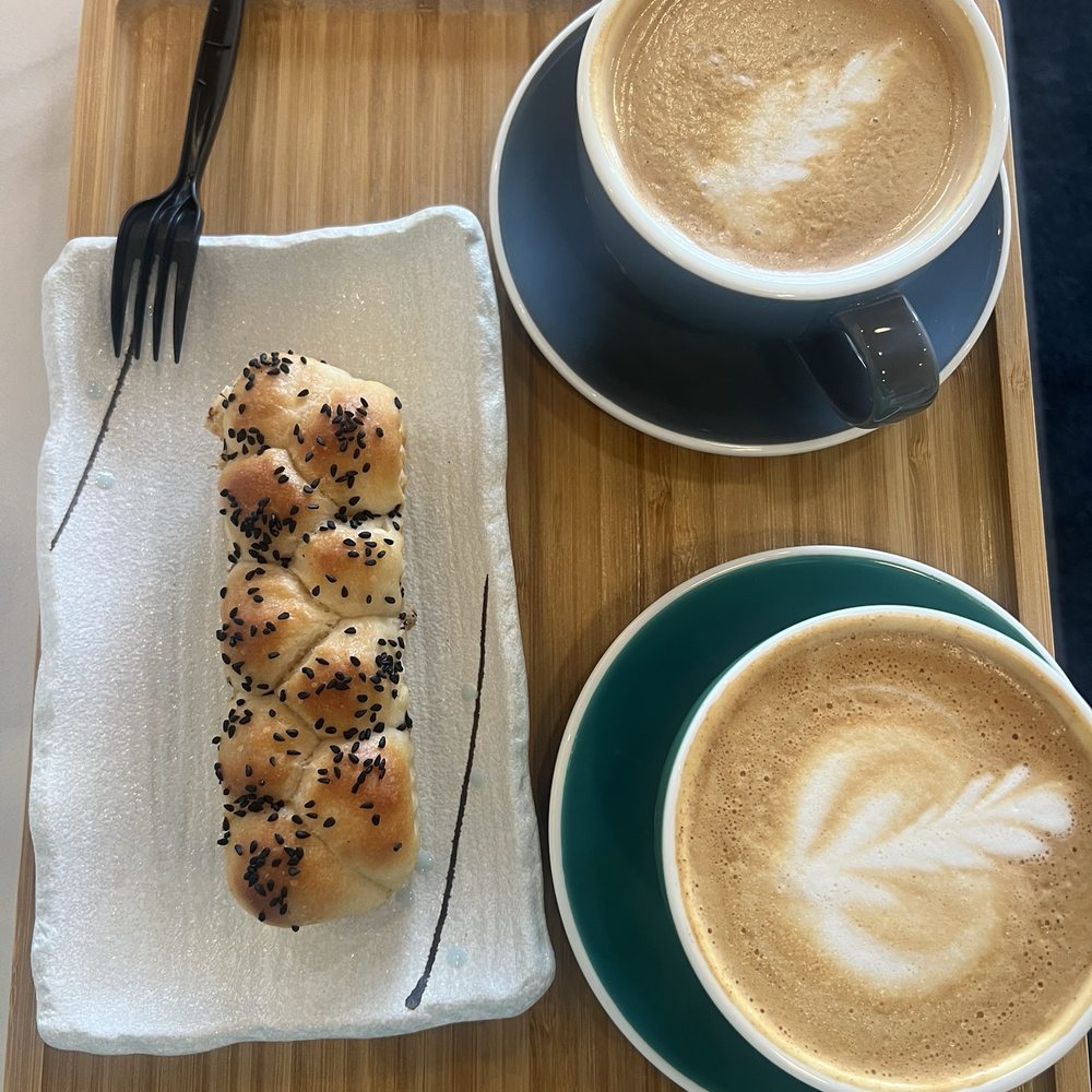 Percent Coffee - Honeycomb bread. Two "% lattes" One with coconut milk and one without cane sugar added and 2% milk. - Coffee & Tea Near Me - Bloomfield Hills, Michigan Percent Coffee - Honeycomb bread. Two "% lattes" One with coconut milk and one without cane sugar added and 2% milk. - Coffee & Tea Near Me - Bloomfield Hills, Michigan